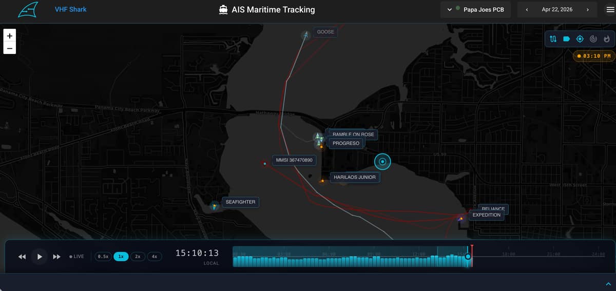 AIS view with named vessels on a map of the harbor and a playback scrubber