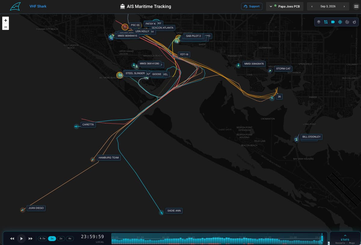 AIS view showing named vessels and their tracks around a harbor, with a playback scrubber